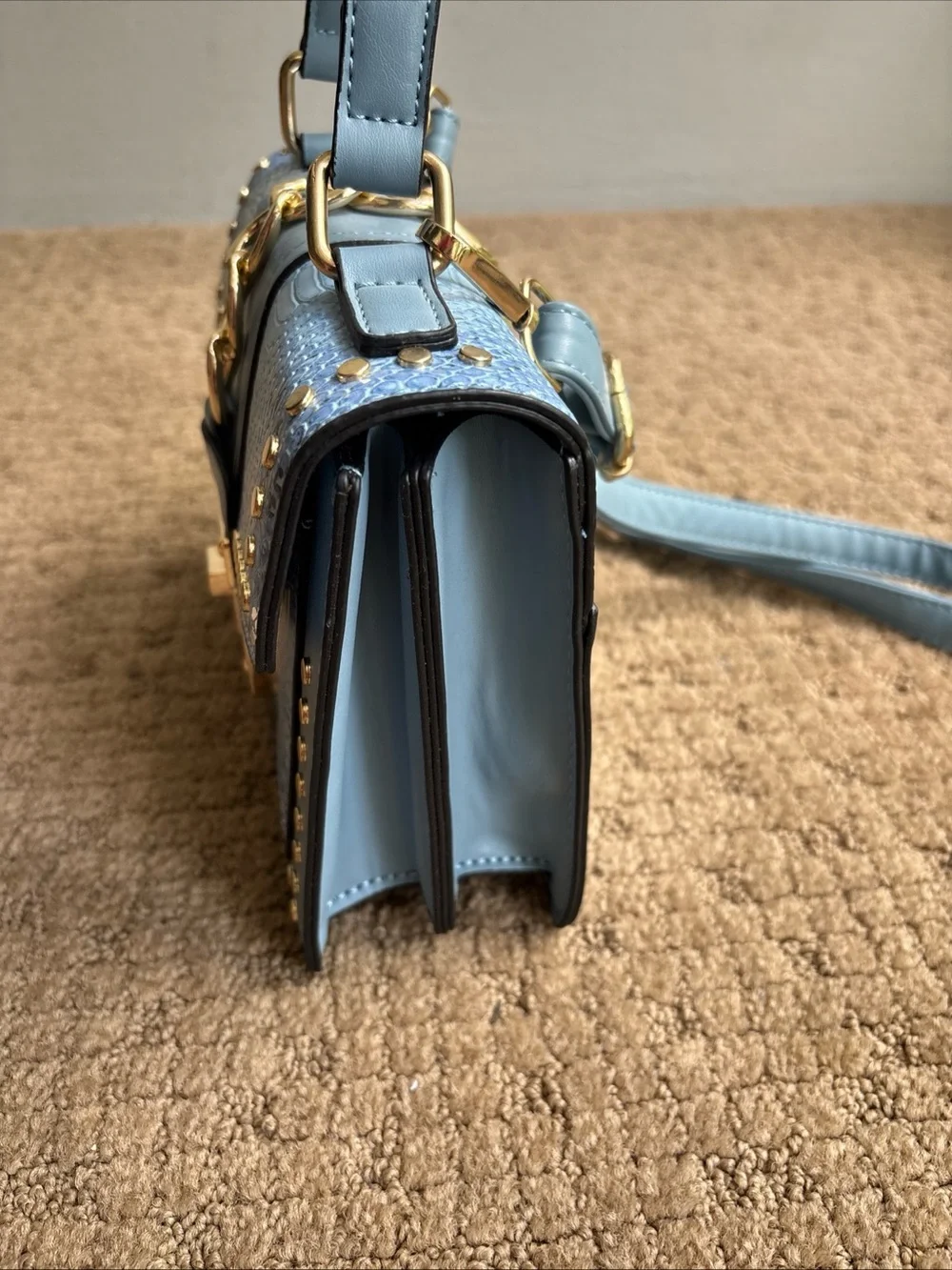 Faux snakeskin crossbody blue purse new with minor mark on bottom